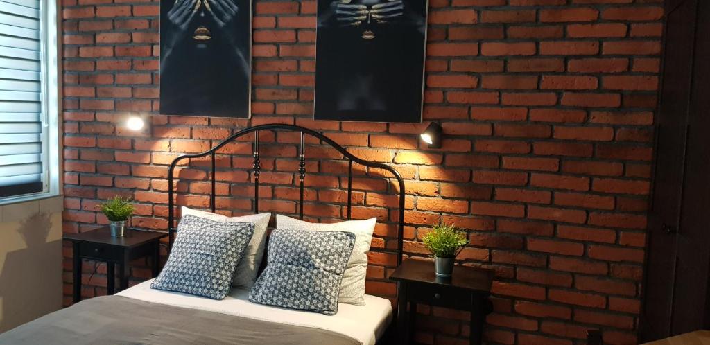 Postel nebo postele na pokoji v ubytování NORTH