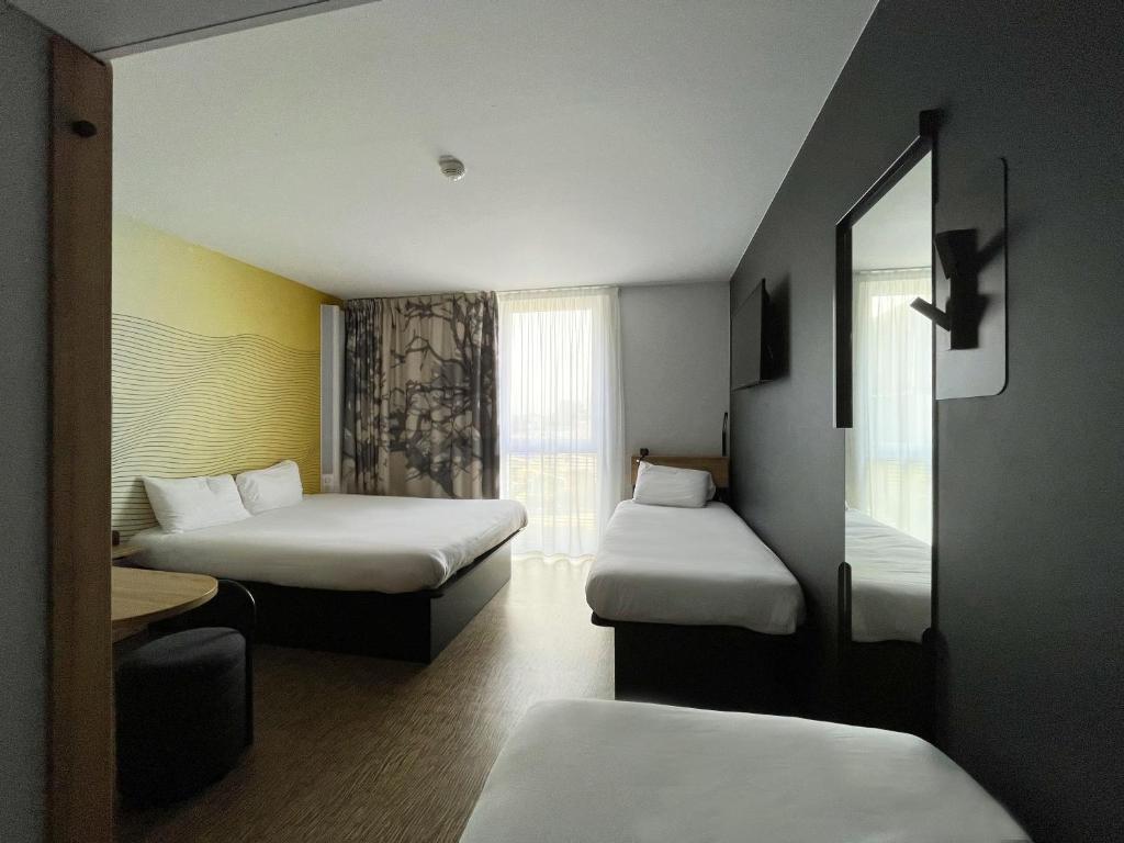 Postel nebo postele na pokoji v ubytování B&B HOTEL Compiègne