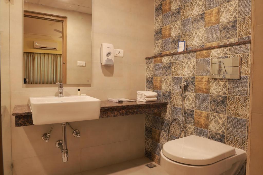 Koupelna v ubytování Starlit Suites Tirupati