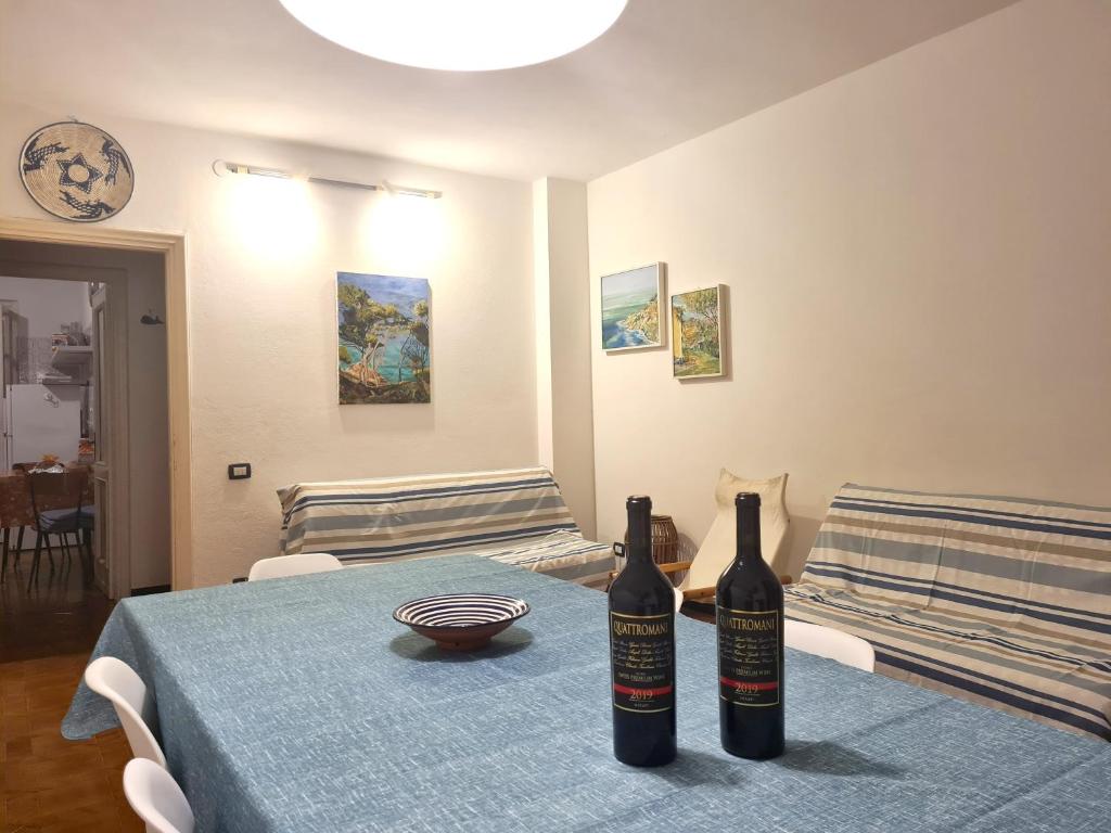 A bed or beds in a room at Sivori Apartment