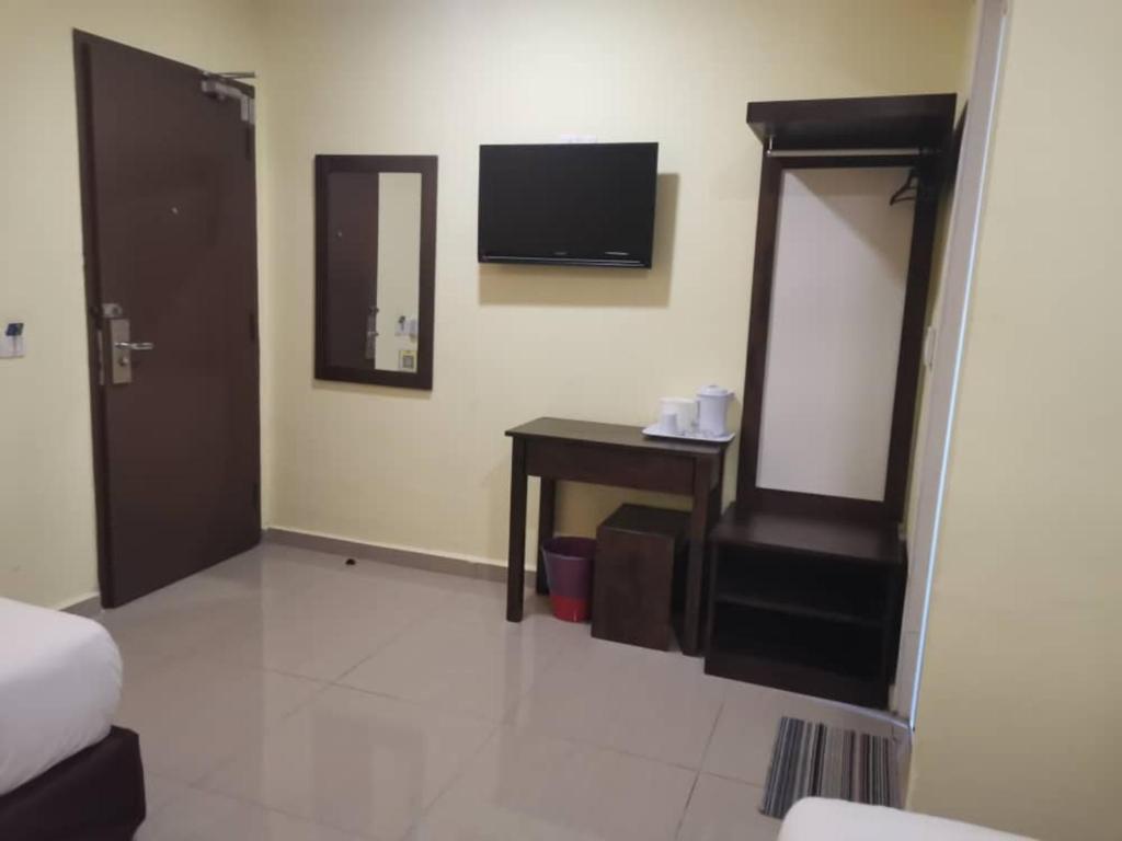 TV a/nebo společenská místnost v ubytování SUN INNS PERMAS JAYA