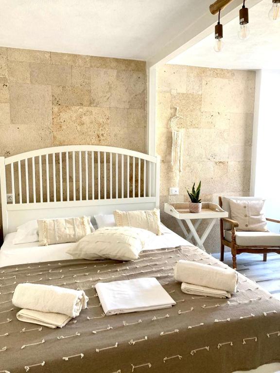 A bed or beds in a room at Nonna Cannella