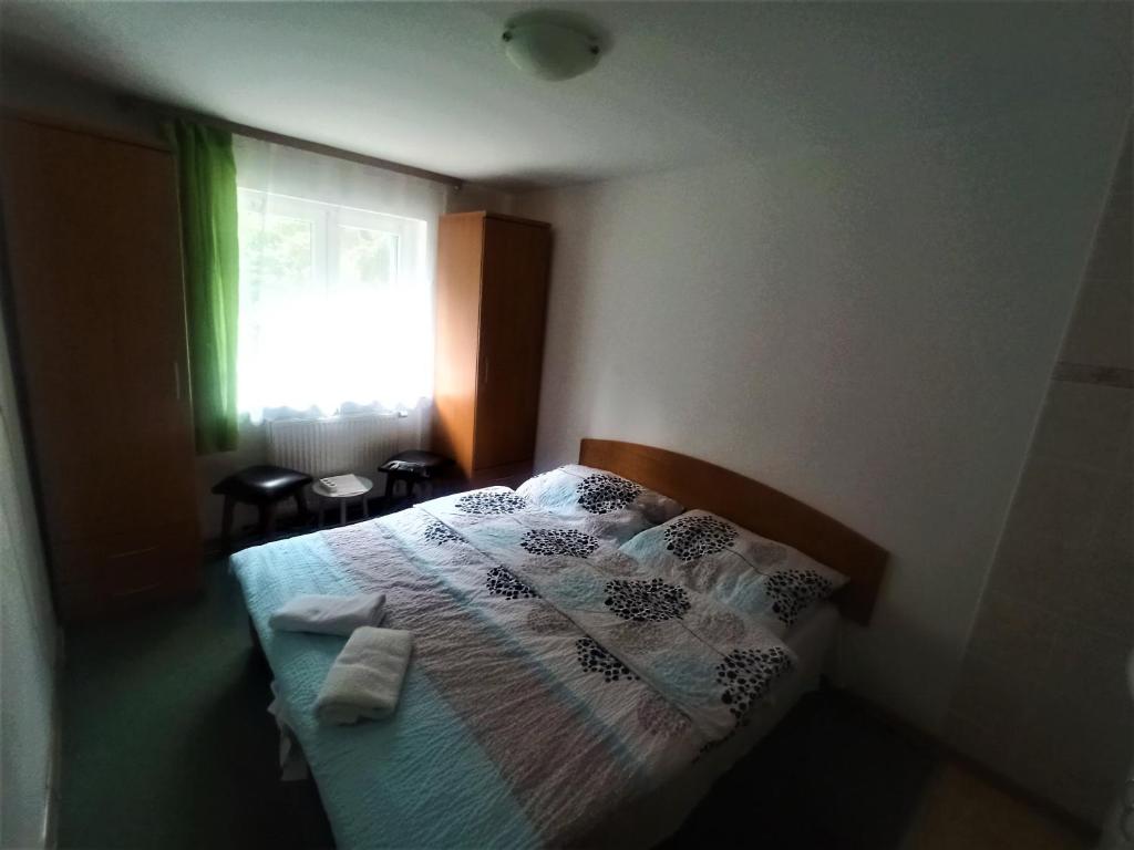 Postel nebo postele na pokoji v ubytování Penzion Modřanka