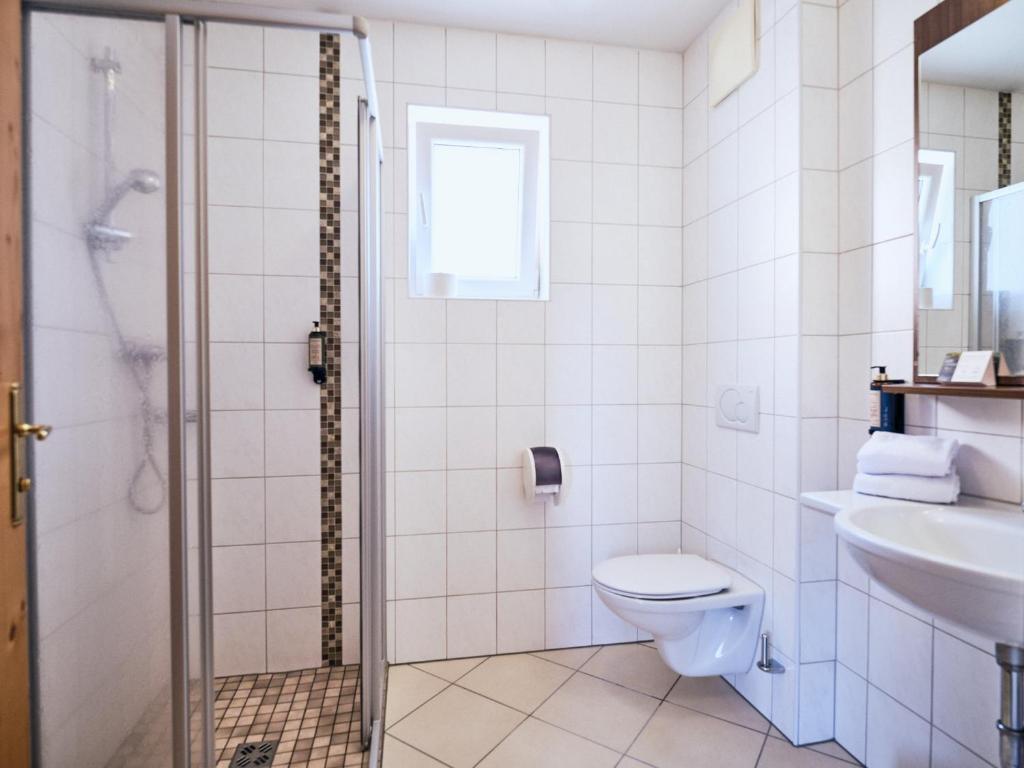 Vannituba majutusasutuses Hotel Kirchboden by Alpeffect Hotels