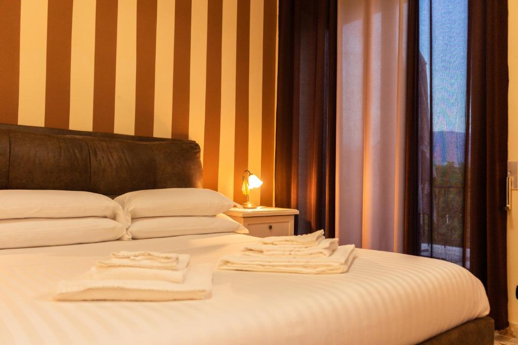 Posteľ alebo postele v izbe v ubytovaní B&B L'EDEN