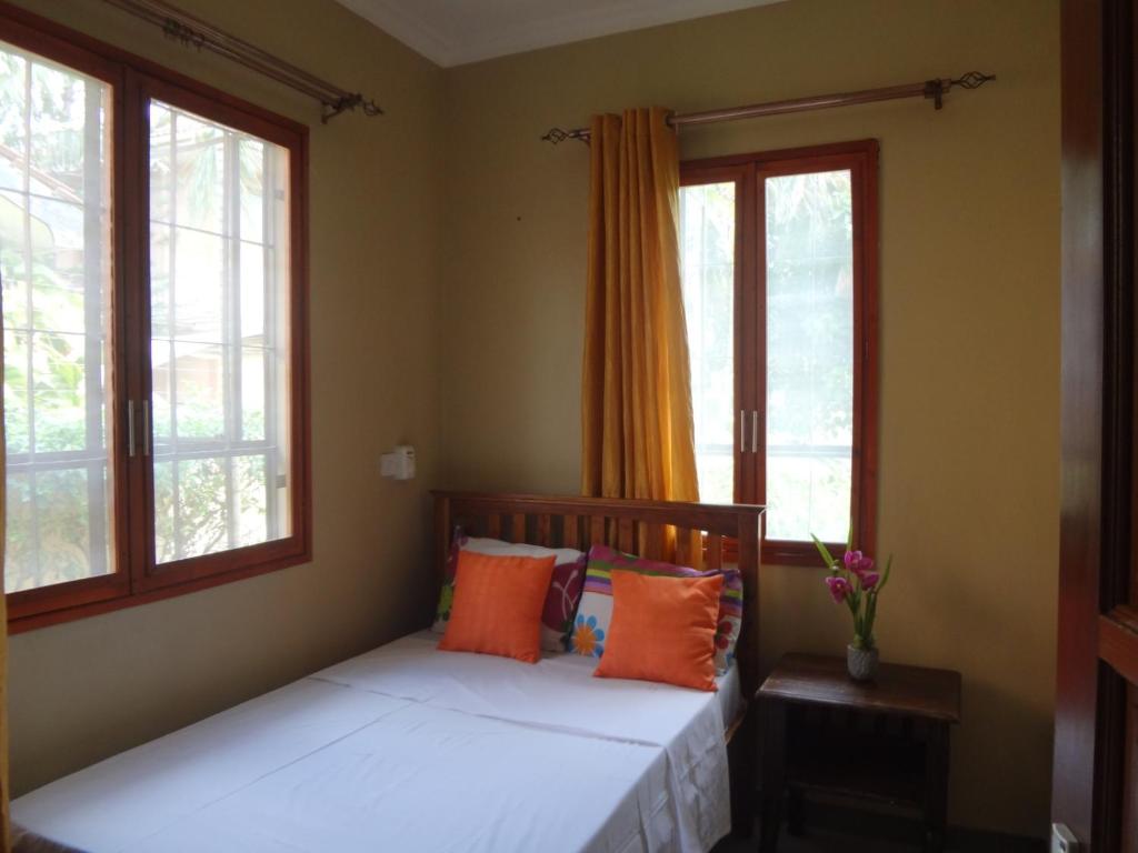 Posteľ alebo postele v izbe v ubytovaní Tukae Inn