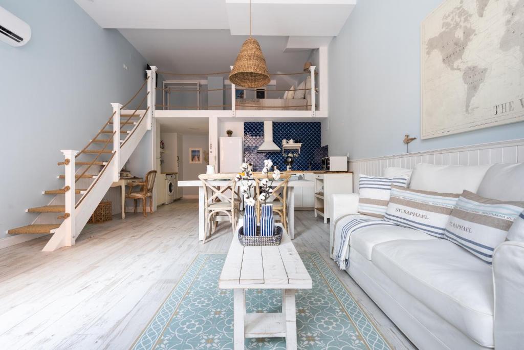 Posezení v ubytování Le Méditarranéen de COUP DE COEUR APPARTEMENTS