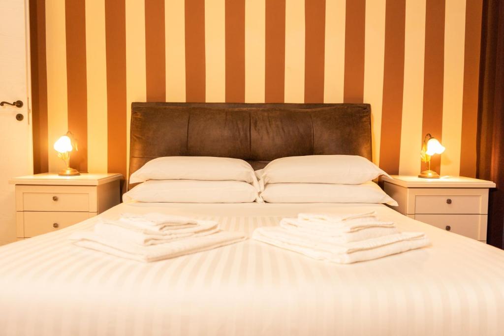Posteľ alebo postele v izbe v ubytovaní B&B L'EDEN