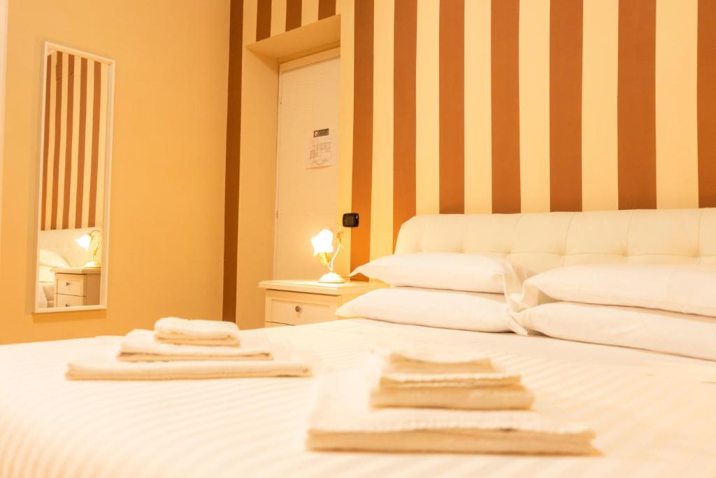 Posteľ alebo postele v izbe v ubytovaní B&B L'EDEN
