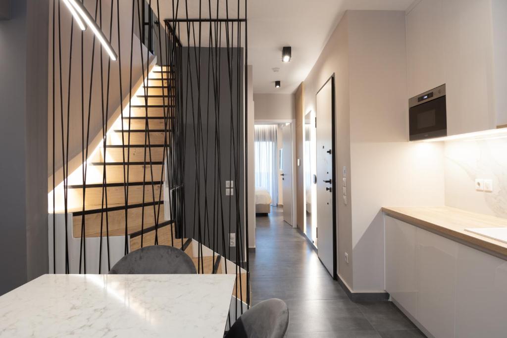 Posteľ alebo postele v izbe v ubytovaní LUX&EASY Athens Downtown Residences