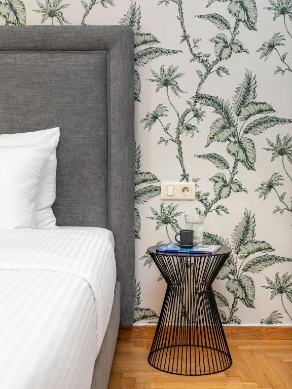 Posteľ alebo postele v izbe v ubytovaní The Beehive Apartments