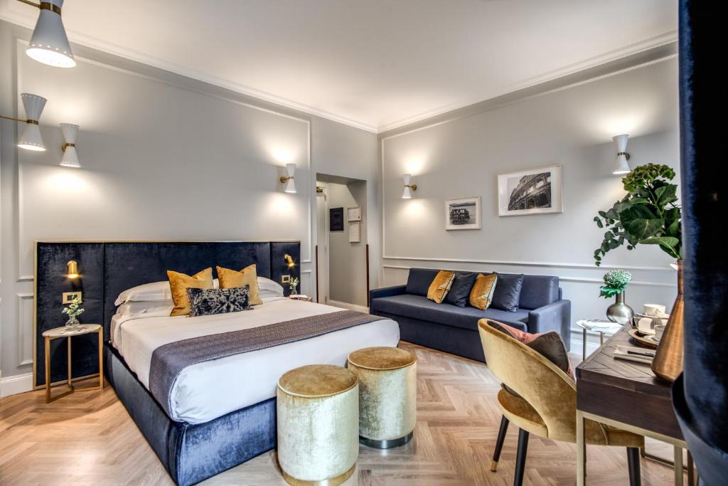 Postel nebo postele na pokoji v ubytování Tree Charme Augusto Luxury Suites