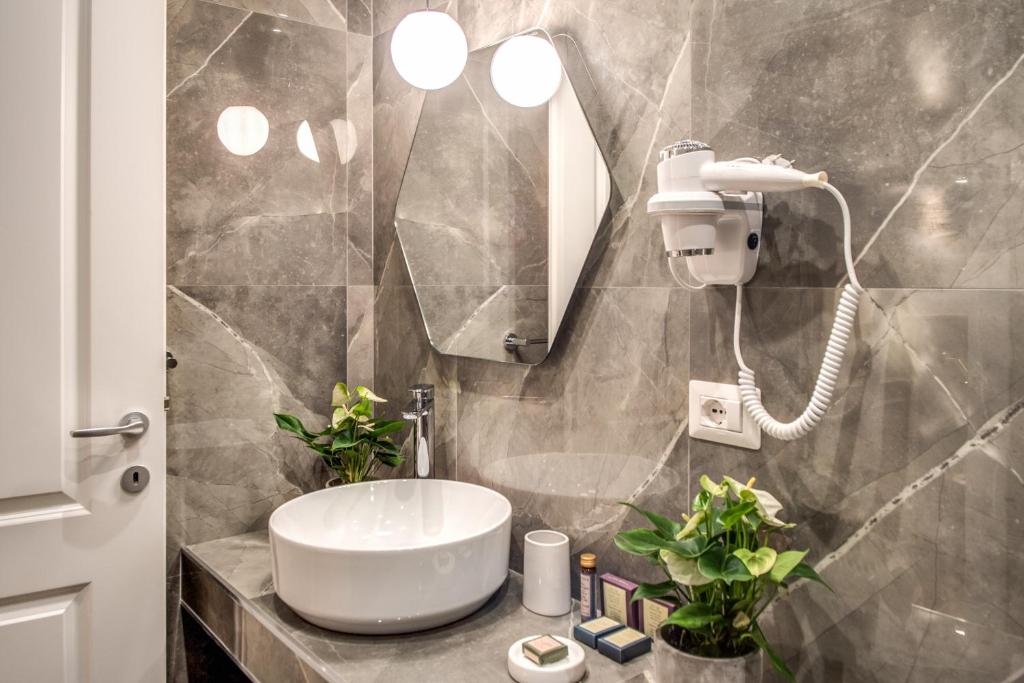Koupelna v ubytování Tree Charme Augusto Luxury Suites