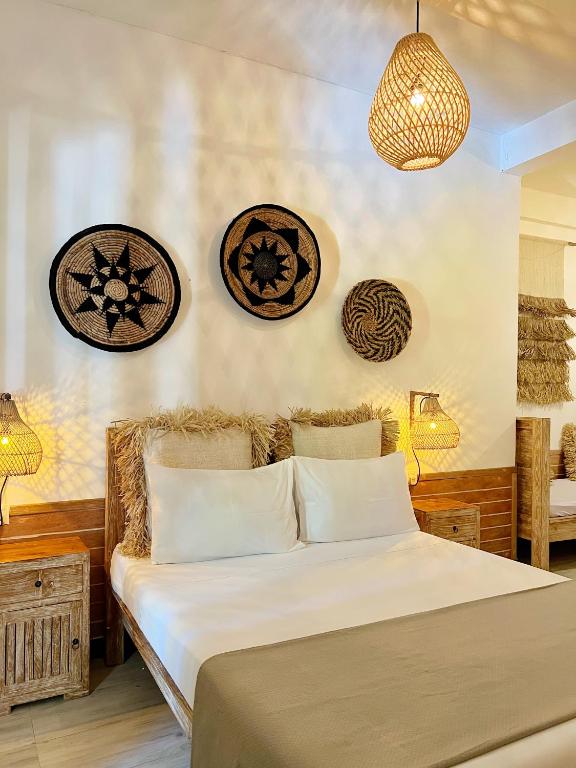 Postel nebo postele na pokoji v ubytování Iru Maldives