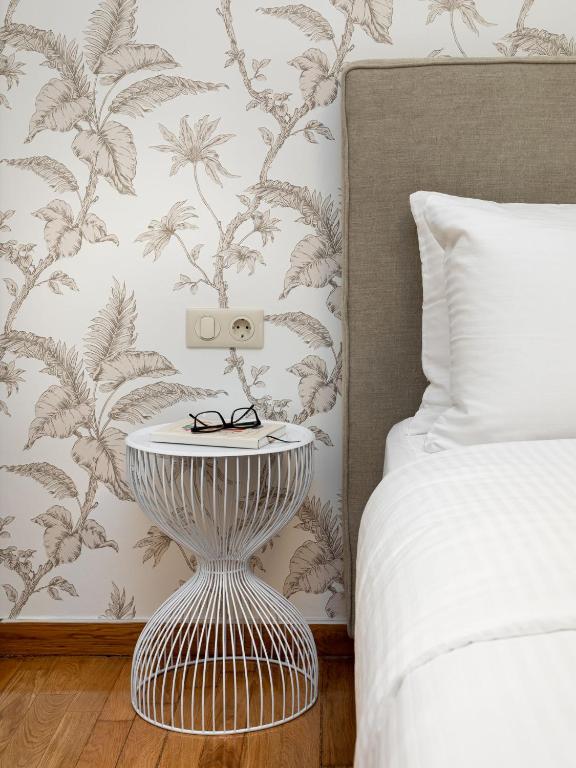 Posteľ alebo postele v izbe v ubytovaní The Beehive Apartments
