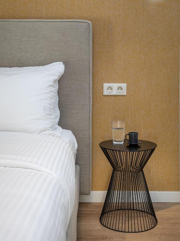 Posteľ alebo postele v izbe v ubytovaní The Beehive Apartments