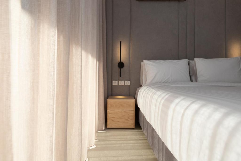 Posteľ alebo postele v izbe v ubytovaní LUX&EASY Athens Downtown Residences