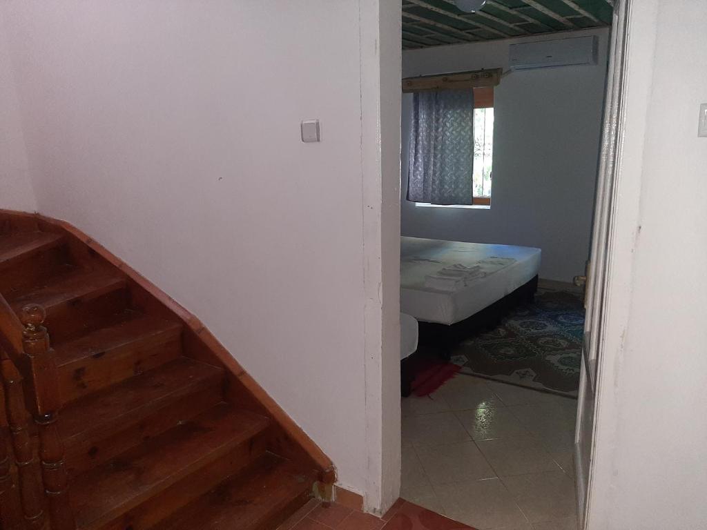 Postel nebo postele na pokoji v ubytování The Fir Gate