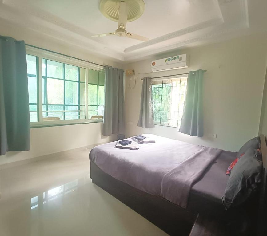 Кровать или кровати в номере Kanvas Suites - Sun N Moon