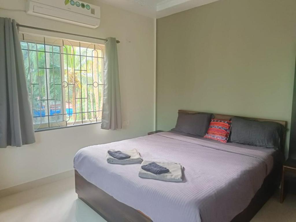 Кровать или кровати в номере Kanvas Suites - Sun N Moon