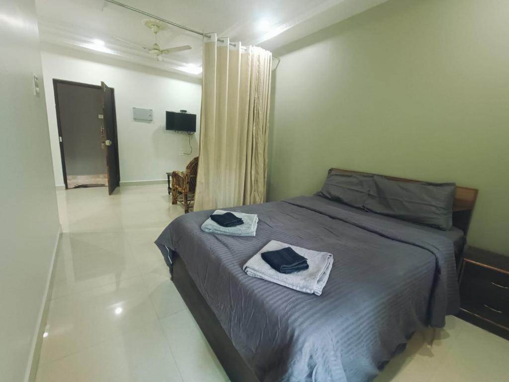 Кровать или кровати в номере Kanvas Suites - Sun N Moon