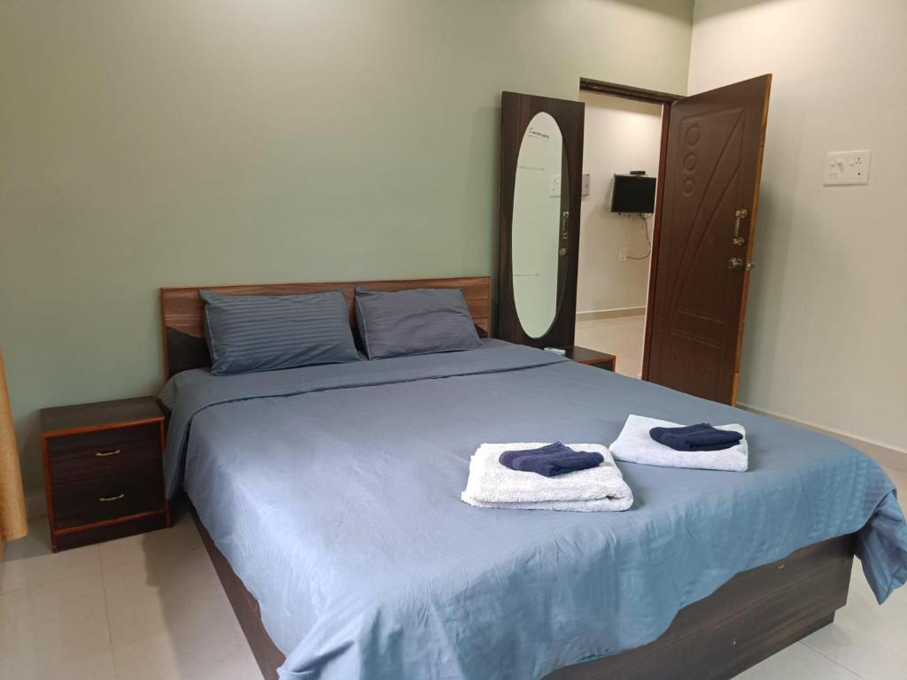 Кровать или кровати в номере Kanvas Suites - Sun N Moon