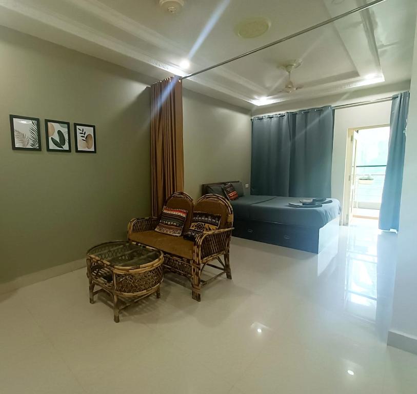 Гостиная зона в Kanvas Suites - Sun N Moon