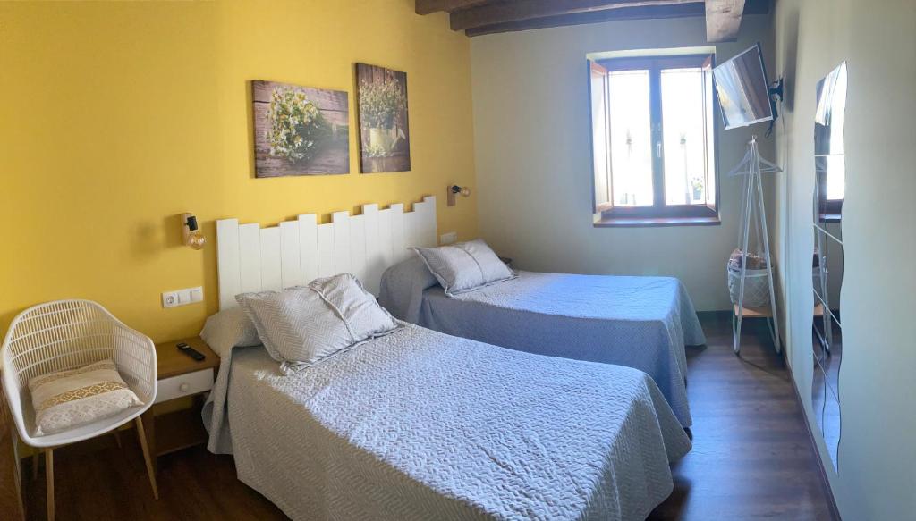 Postel nebo postele na pokoji v ubytování Casa da Cota