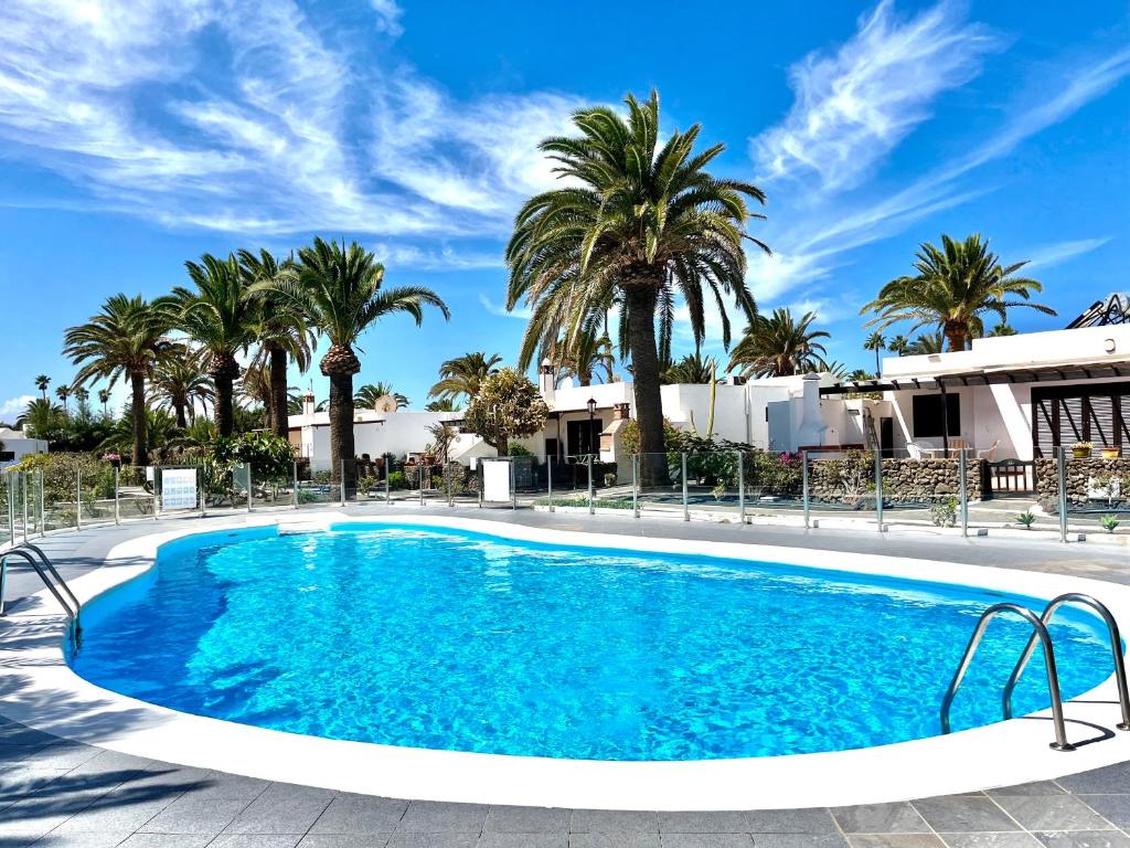 Bazén v ubytování TERRACITAS 3 HIRU , Coqueto bungalow con AC , terraza y piscina comunitaria nebo v jeho okolí