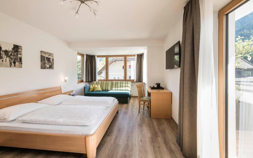 Postel nebo postele na pokoji v ubytování B&B Villa Angelino