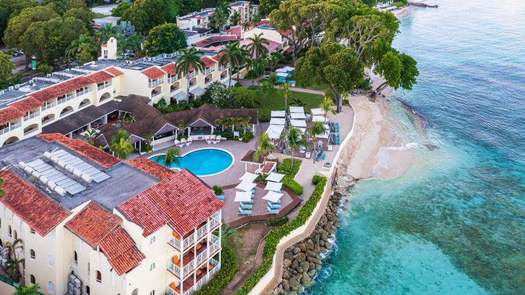 an aerial view of a resort and the ocean at Tamarind by Elegant Hotels - All-Inclusive in Saint James