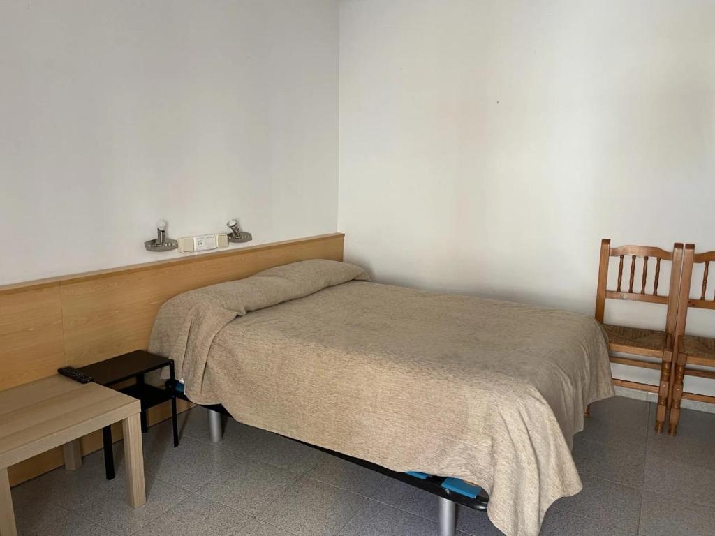 Postel nebo postele na pokoji v ubytování Fonda Joan