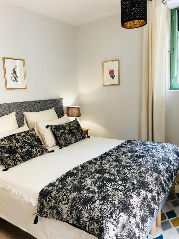 Postel nebo postele na pokoji v ubytování Maison Tassigny