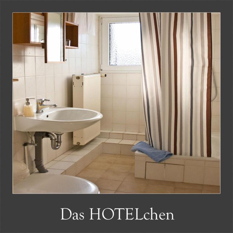 Koupelna v ubytování Das HOTELchen