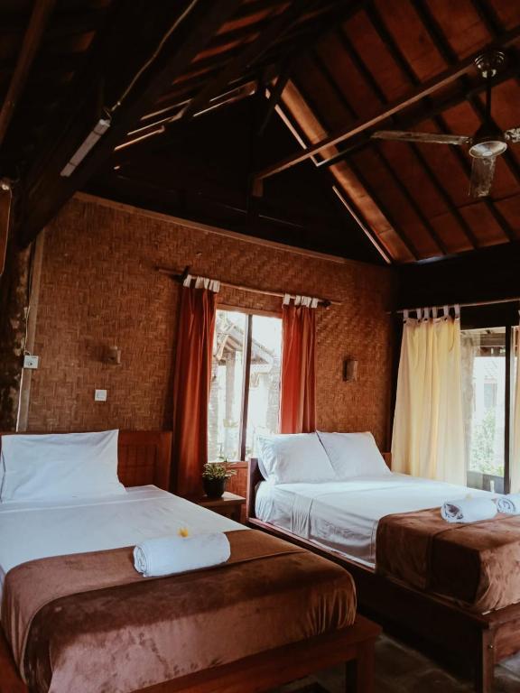 Jembrana Bali Homestay - Habitación Triple Con Vista Al Jardín