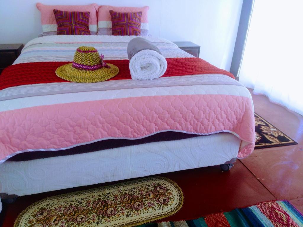 Postel nebo postele na pokoji v ubytování Titicaca wasy lodge