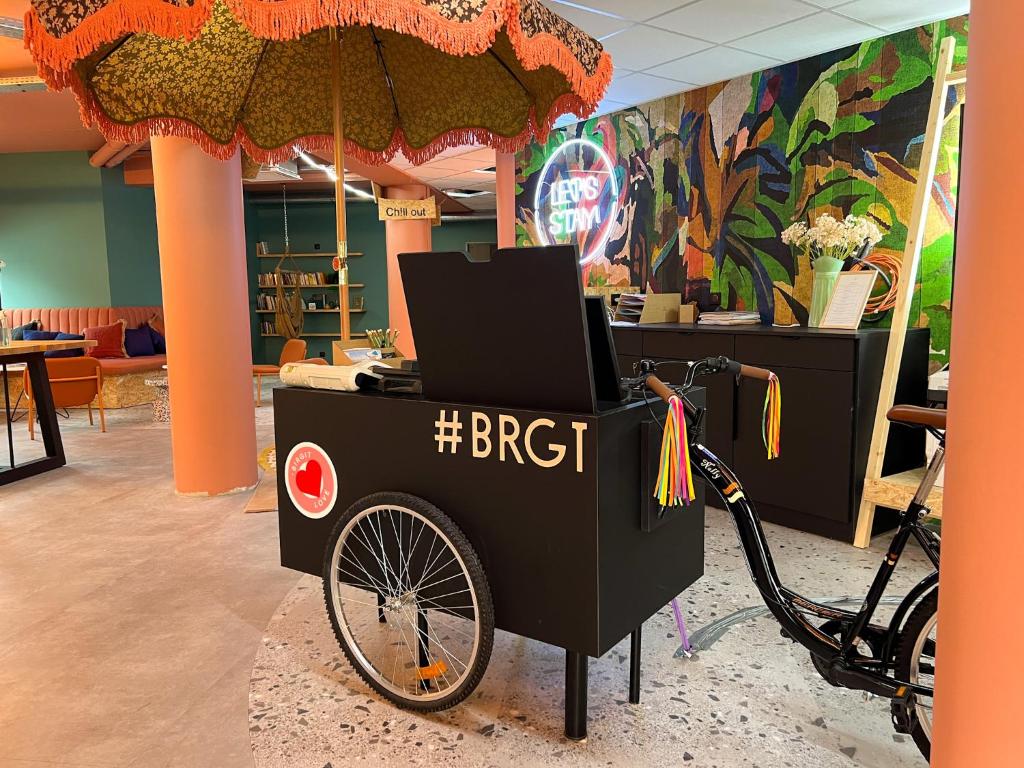 a bike with a laptop on top of it at Birgit Hôtel Le Havre Centre in Le Havre