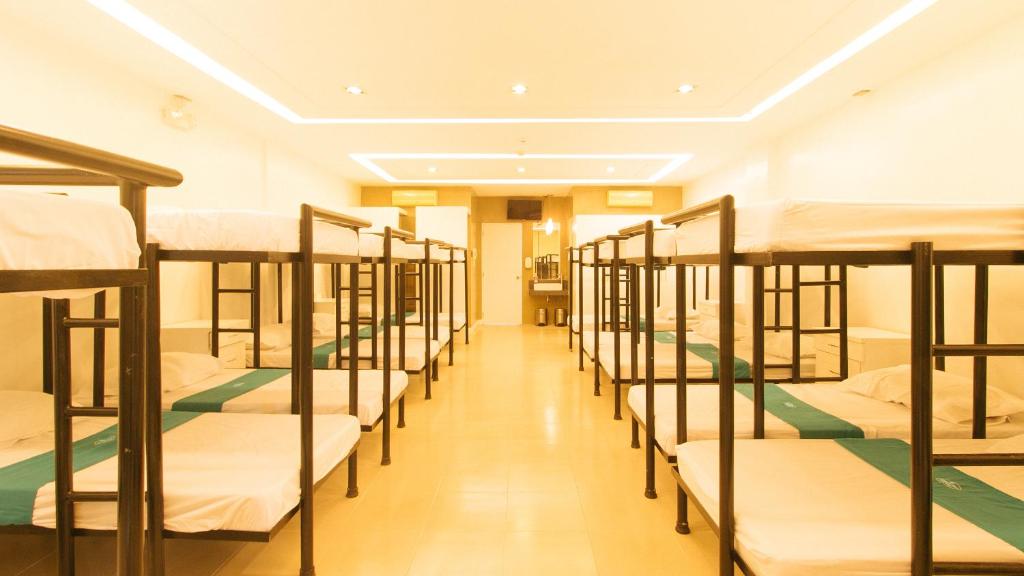 Postel nebo postele na pokoji v ubytování SOUTHPICKRESORT & HOTEL INC.