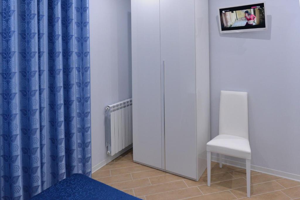 TV a/nebo společenská místnost v ubytování Residenza Duomo