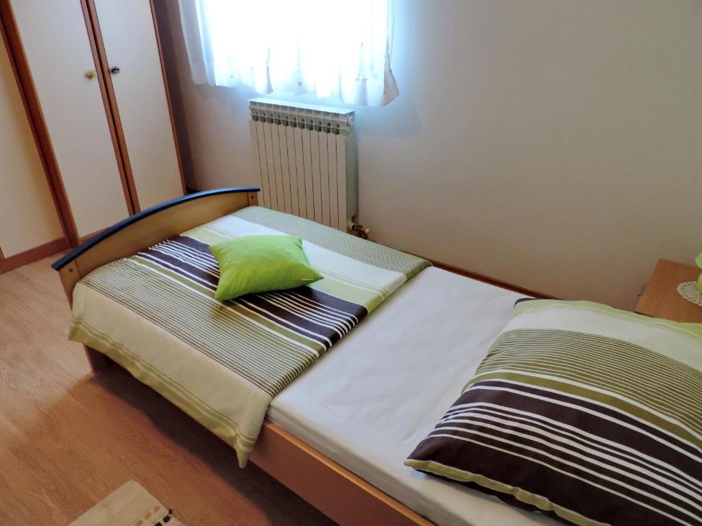 Postel nebo postele na pokoji v ubytování Apartment Perić