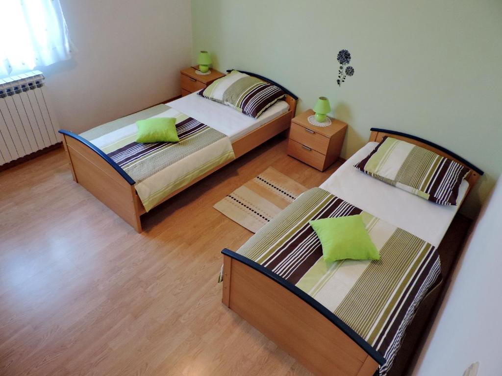 Postel nebo postele na pokoji v ubytování Apartment Perić