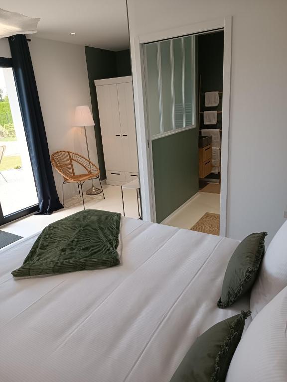 Postel nebo postele na pokoji v ubytování Maison Bailly