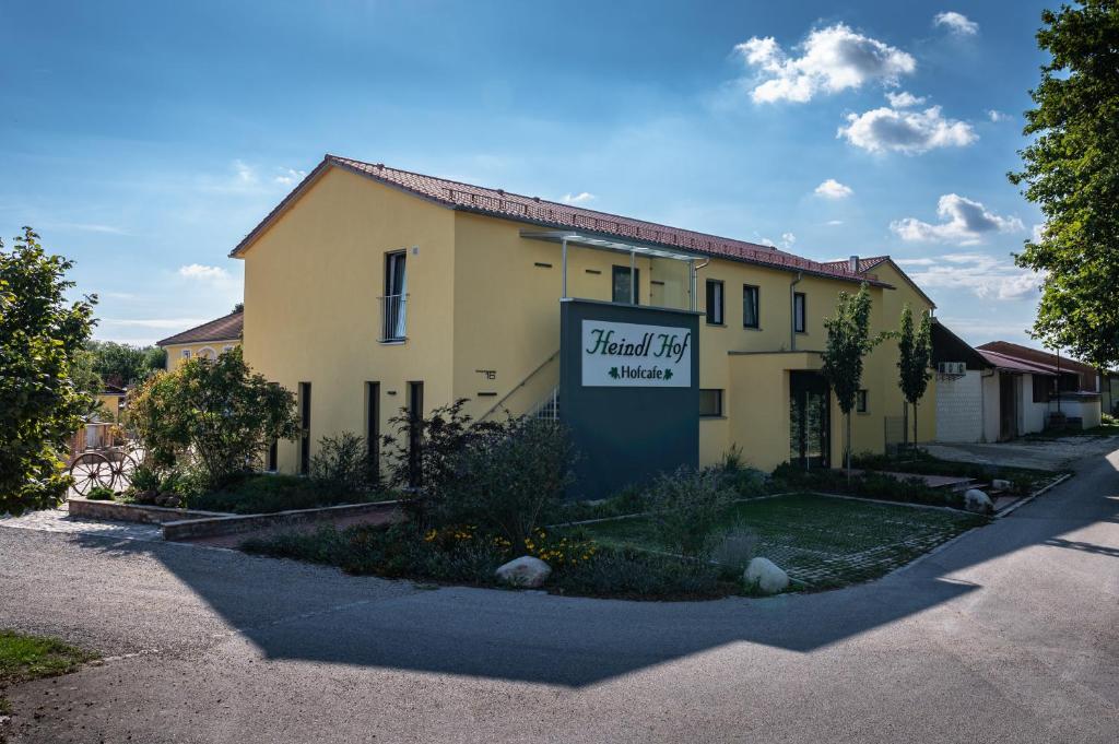 a building with a sign that reads final risk mercy at HeindlHof in Ingolstadt