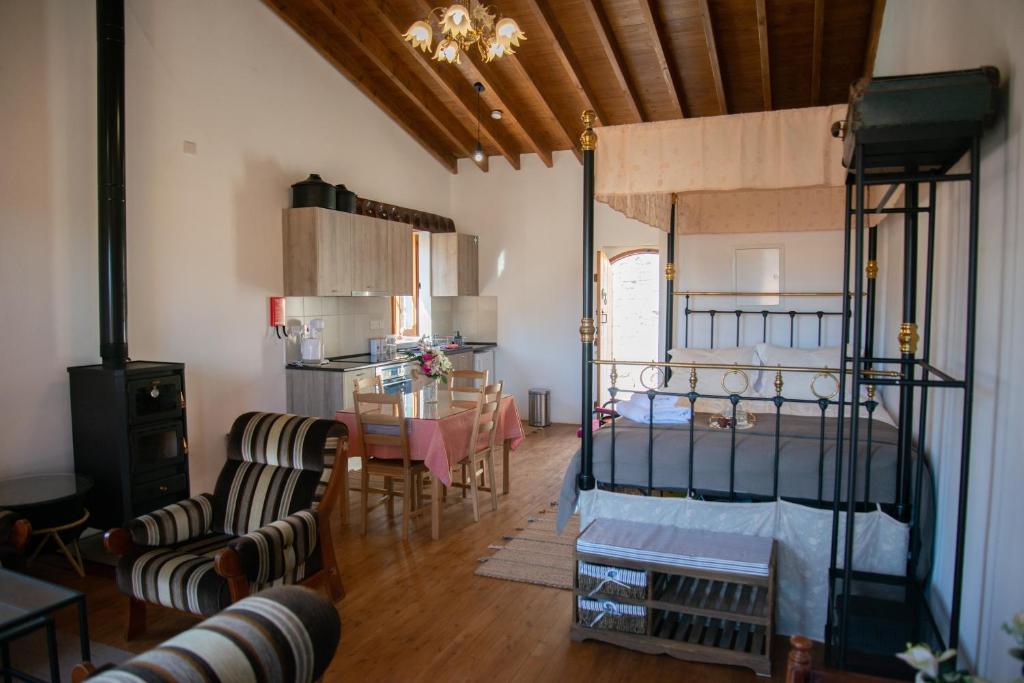 Postel nebo postele na pokoji v ubytování Cleo's Inn