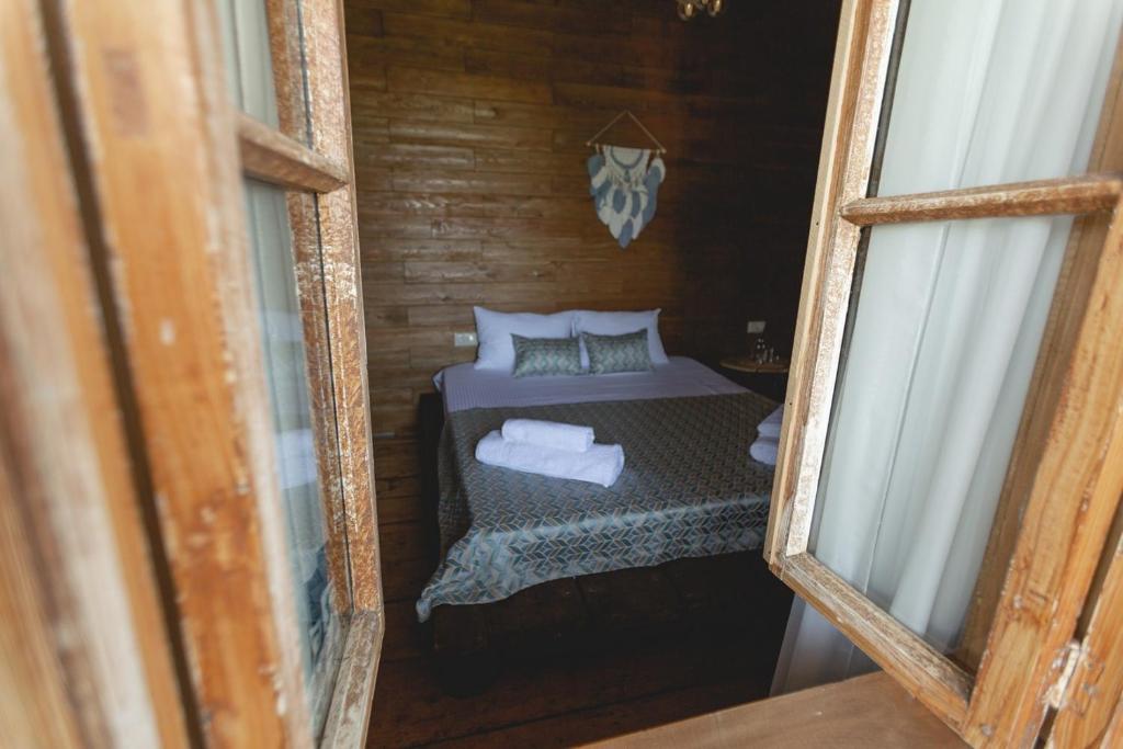 Postel nebo postele na pokoji v ubytování CHALET PANORAMA NIKORTSMINDA