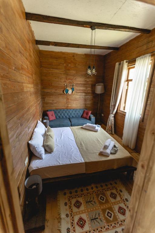 Postel nebo postele na pokoji v ubytování CHALET PANORAMA NIKORTSMINDA