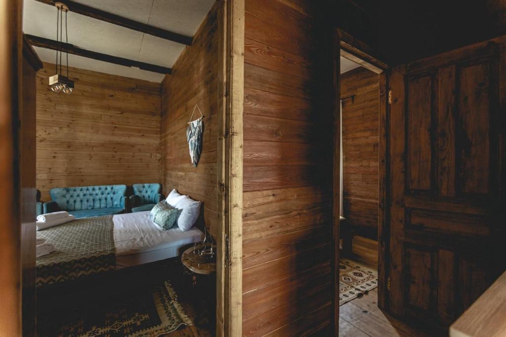 Postel nebo postele na pokoji v ubytování CHALET PANORAMA NIKORTSMINDA
