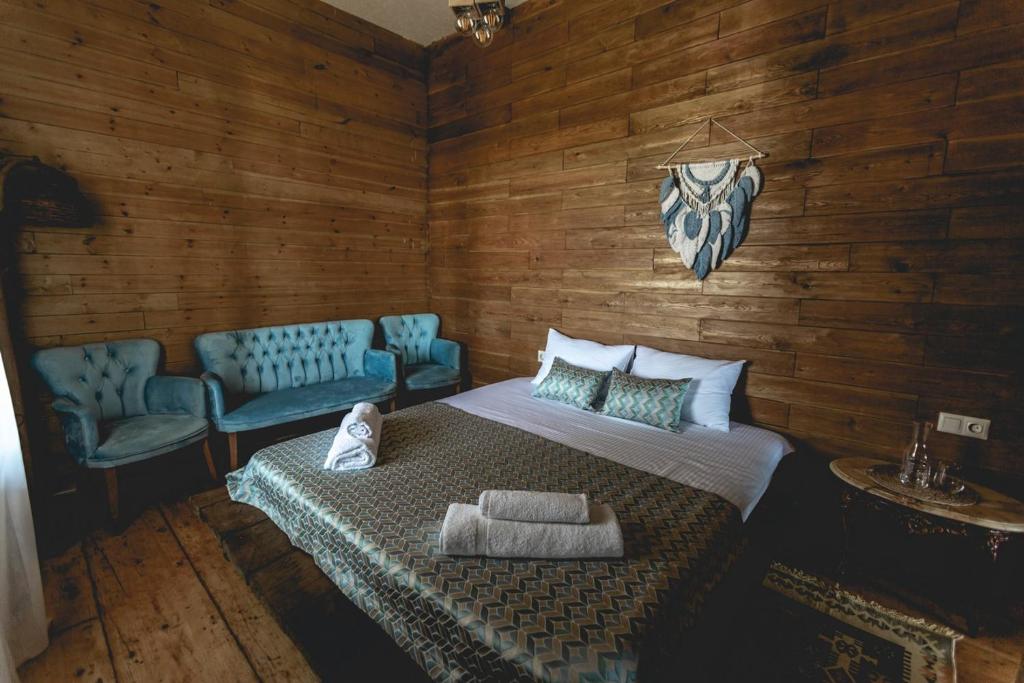 Postel nebo postele na pokoji v ubytování CHALET PANORAMA NIKORTSMINDA