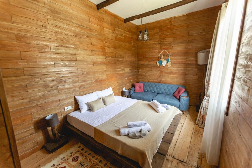 Postel nebo postele na pokoji v ubytování CHALET PANORAMA NIKORTSMINDA
