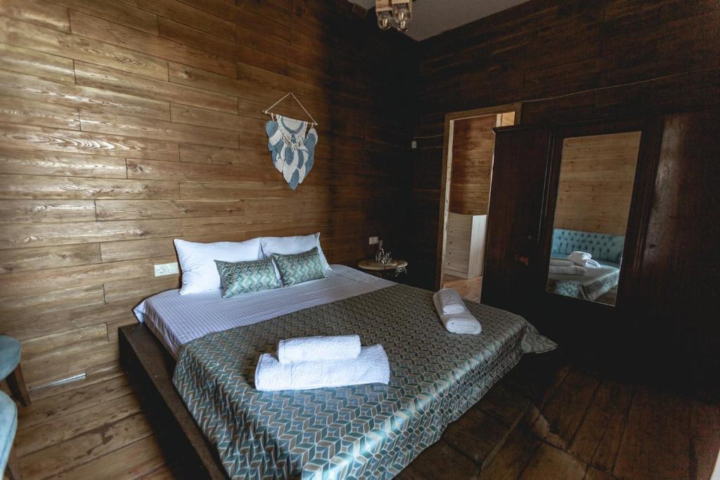Postel nebo postele na pokoji v ubytování CHALET PANORAMA NIKORTSMINDA